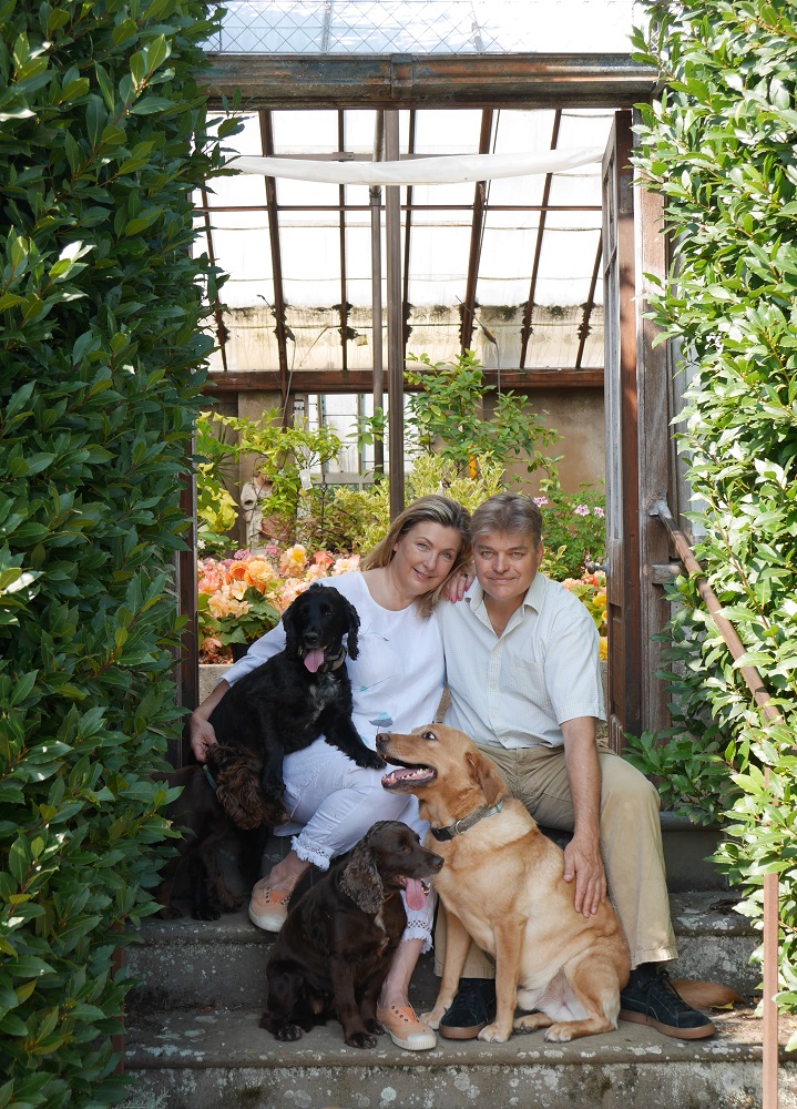 Earl and Countess Carnarvon with their dogs. Imagery courtesy of Highclere Castle Gin.