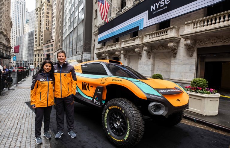 Emma Gilmour and Tanner Foust, Drivers, outside of the NYSE - Photography courtesy of NYSE, provided by McLaren Racing