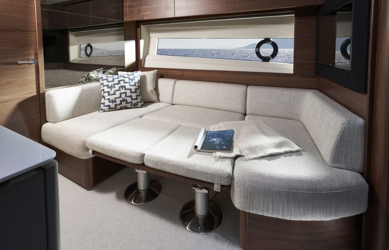 Princess V50 - Interior dining area with optional double berth conversion - Imagery courtesy of Princess Yachts Limited 2021